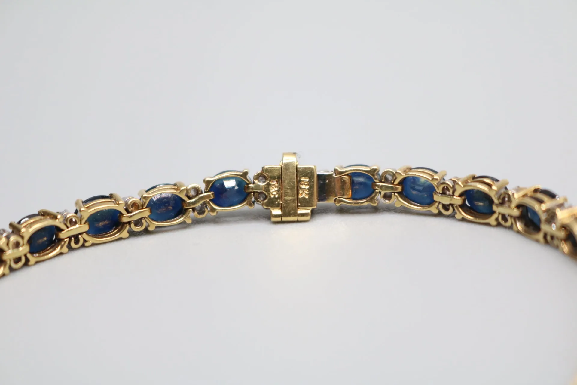 18K Yellow Gold Oval Cut Natural Sapphire and Diamond Tennis-Style Bracelet (Length 7.5 Inches) (Local Pick-Up Only)