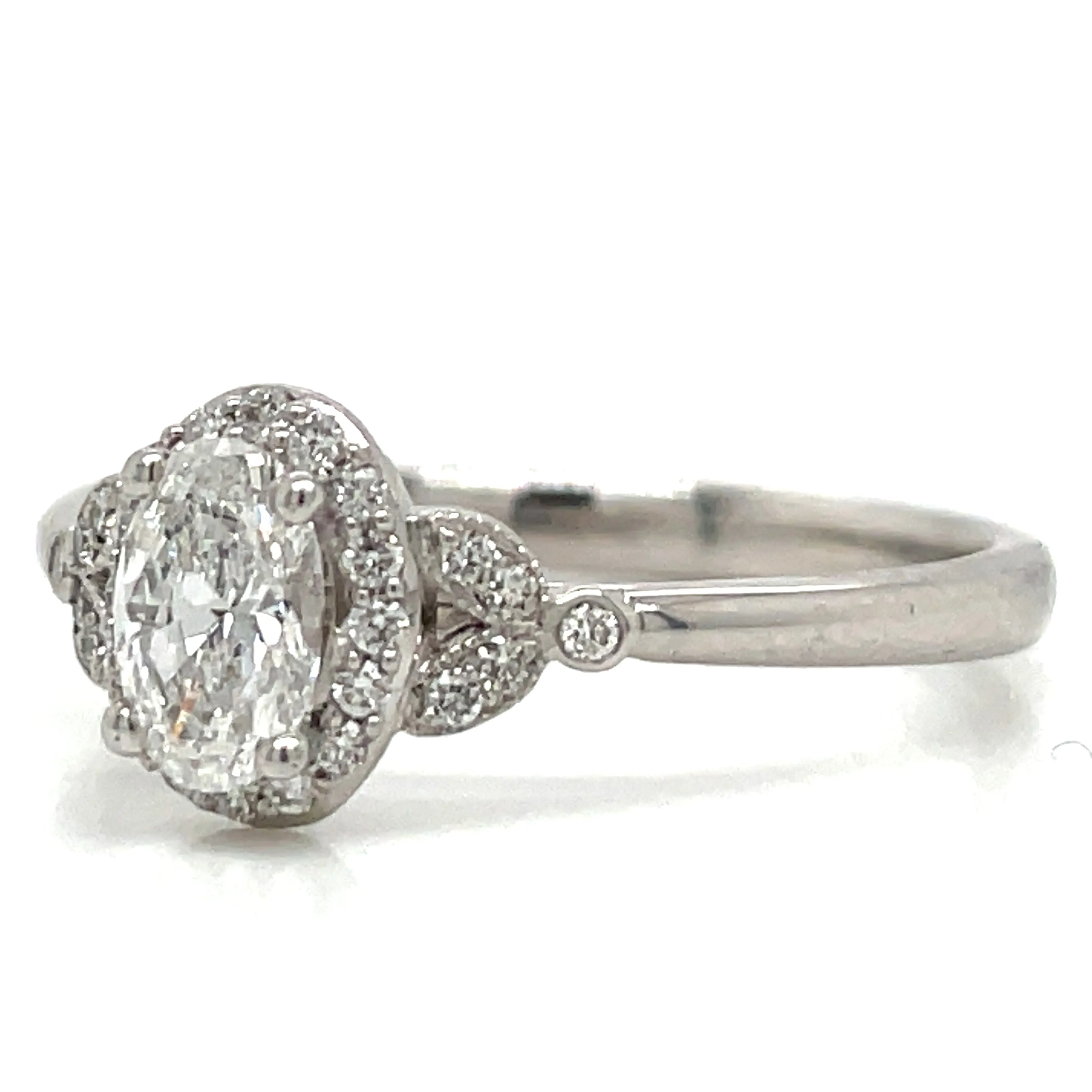 Avril - Platinum Natural 0.52ct Oval Halo Diamond Engagement Ring With Vintage Side Detail