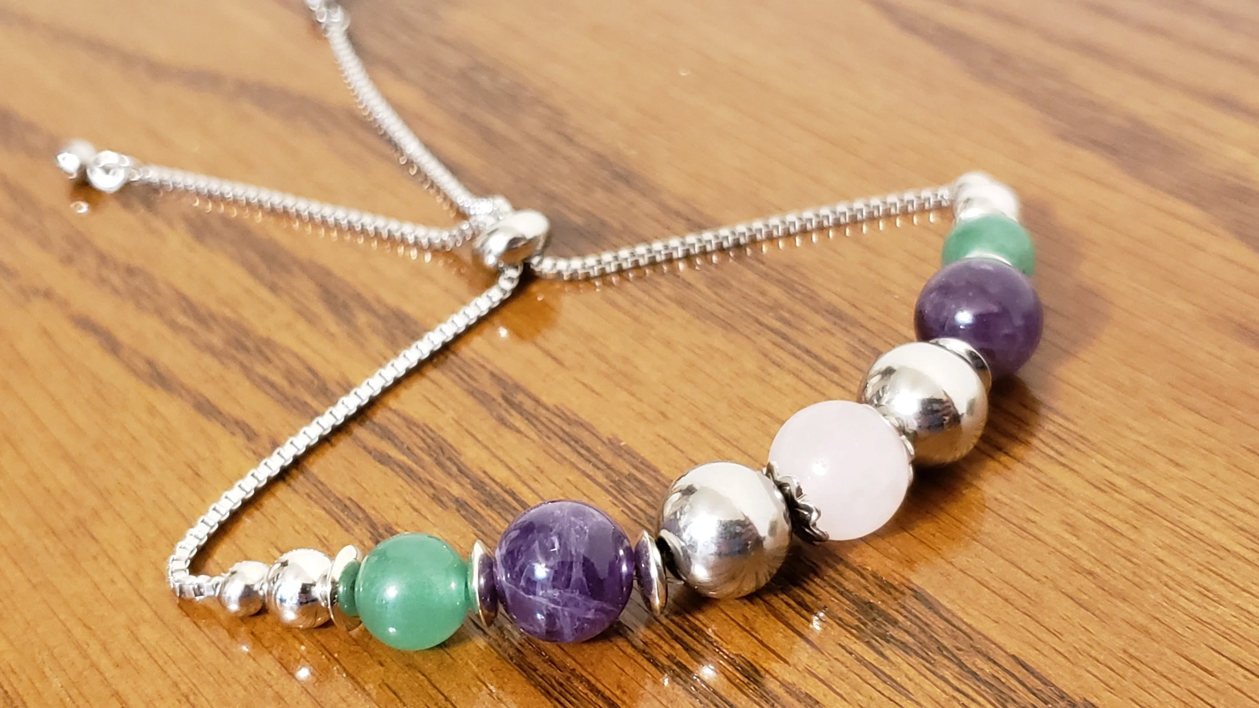 Hand Crafted Rose Quartz, Amethyst, Adventurine & Stainless Steel Bolo Style Bracelet, Adjustable.
 
