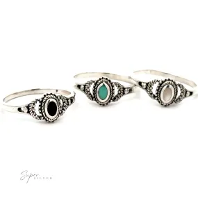 Inlaid Oval Stone Ring with Rope Texture